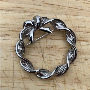 Vintage circle brooch pin silver tone bow